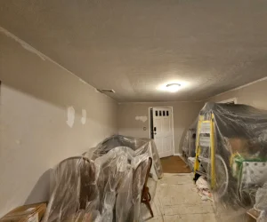 A spackled wall in a residential home in Delaware County, PA