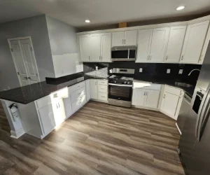 A residential kitchen in Delaware County, PA with newly installed vinyl flooring